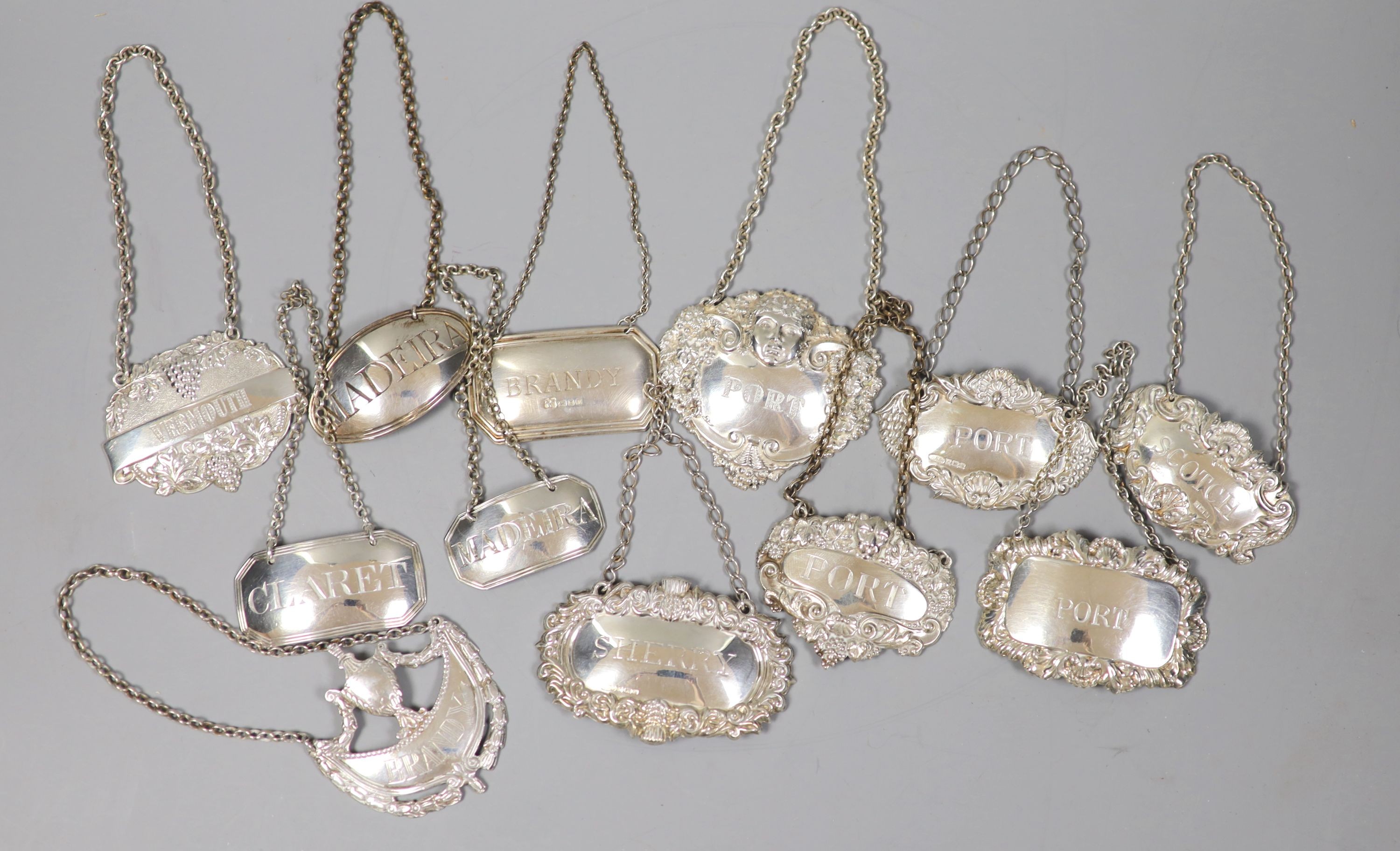 Three 19th century silver wine labels, Madeira(2) & Claret, six modern silver wine labels and three others.
